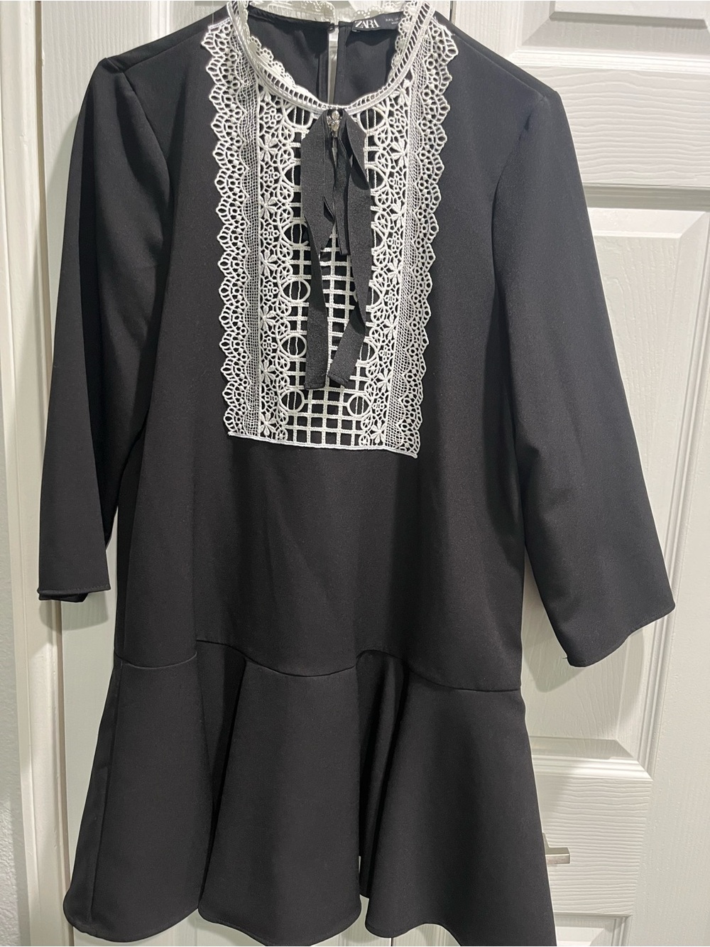 Black Dress with White Lace Bib and Ribbon Tie